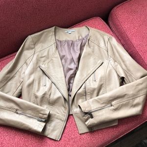 Tan jacket with zipper details